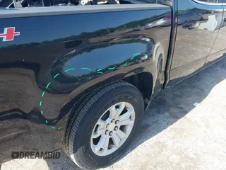 2018 Chevrolet Colorado 4WD LT z VIN 1GCGTCEN0J1265248, wystawiony jako IAAI lot #42247568 z przebiegiem 74 863 mil mil oraz . Historia ofert i sprzedaży dostępna na DreamBid. Obrazek 21.