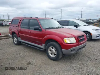 2002 Ford Explorer Sport Trac Value z VIN 1FMZU77E12UD41808, wystawiony jako IAAI lot #42395951 z przebiegiem 276 920 mil mil oraz . Historia ofert i sprzedaży dostępna na DreamBid. Obrazek 1.