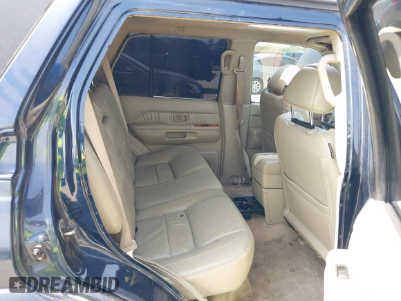 2003 Infiniti QX4 z VIN JNRDR09X03W252081, wystawiony jako IAAI lot #42262536 z przebiegiem 155 093 mil mil oraz . Historia ofert i sprzedaży dostępna na DreamBid. Obrazek 8.