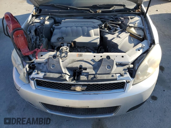 2012 Chevrolet Impala LTZ with VIN 2G1WC5E32C1171240, listed as a Copart auction lot 84490854 with 193,799 mi miles and Salvage Title. Bid and sale history available at DreamBid. Image 12.