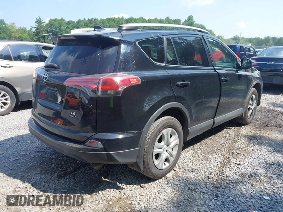 2017 Toyota RAV4 LE with VIN 2T3BFREV5HW651308, listed as a IAAI auction lot 42701783 with 112,829 mi miles and . Bid and sale history available at DreamBid. Image 4.