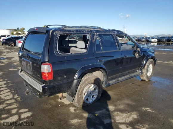 2000 Toyota 4Runner SR5 with VIN JT3HN86R1Y0317584, listed as a Copart auction lot 44157355 with 199,957 mi miles and Salvage Title. Bid and sale history available at carsss.com. Image 3.