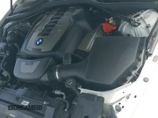 2006 BMW 6 Series 650Ci z VIN WBAEK134X6CN75036, wystawiony jako IAAI lot #42695984 z przebiegiem 122 149 mil mil oraz . Historia ofert i sprzedaży dostępna na DreamBid. Obrazek 11.