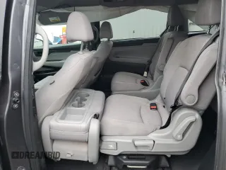 2018 Honda Odyssey EX z VIN 5FNRL6H56JB108661, wystawiony jako Copart lot #62807955 z przebiegiem 96 164 mil mil oraz Szkoda całkowita • Salvage title. Historia ofert i sprzedaży dostępna na DreamBid. Obrazek 11.