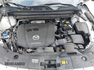 2020 Mazda CX-5 Touring z VIN JM3KFBCM2L0786784, wystawiony jako IAAI lot #42127457 z przebiegiem 62 665 mil mil oraz . Historia ofert i sprzedaży dostępna na DreamBid. Obrazek 10.