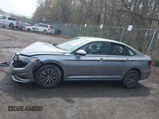 2021 Volkswagen Jetta S z VIN 3VWC57BUXMM048600, wystawiony jako IAAI lot #41956222 z przebiegiem 59 870 mil mil oraz . Historia ofert i sprzedaży dostępna na DreamBid. Obrazek 14.