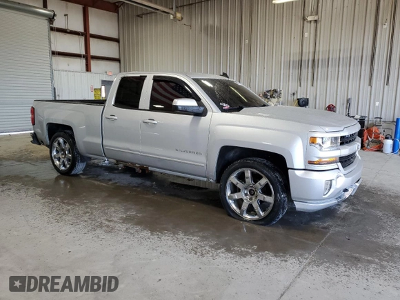 2016 Chevrolet Silverado 1500 LT with VIN 1GCVKREC2GZ307053, listed as a Copart auction lot 50263555 with 146,093 mi miles and Salvage Title. Bid and sale history available at DreamBid. Image 4.