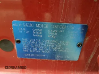 2002 Suzuki Aerio S z VIN JS2RA41S725102774, wystawiony jako Copart lot #84017314 z przebiegiem 145 506 mil mil oraz Szkody całkowita. Historia ofert i sprzedaży dostępna na DreamBid. Obrazek 12.