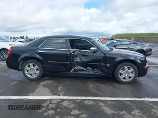 2006 Chrysler 300 C with VIN 2C3LK63H66H142437, listed as a IAAI auction lot 41751890 with 57,374 mi miles. Bid and sale history available at carsss.com. Image 13.