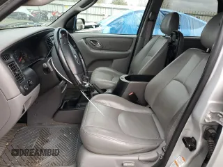 2002 Mazda Tribute LX with VIN 4F2CU08192KM41728, listed as a Copart auction lot 78221954 with 140,782 mi miles and Salvage Title. Bid and sale history available at carsss.com. Image 7.