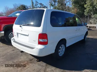 2005 Kia Sedona LX with VIN KNDUP132956703200, listed as a IAAI auction lot 41700159 with 125,578 mi miles. Bid and sale history available at carsss.com. Image 4.
