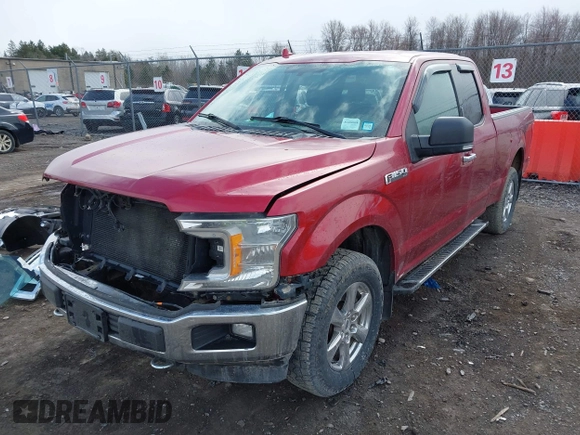 2018 Ford F-150 XL z VIN 1FTFX1E5XJFB66587, wystawiony jako IAAI lot #41870713 z przebiegiem 72 991 mil mil oraz . Historia ofert i sprzedaży dostępna na DreamBid. Obrazek 23.