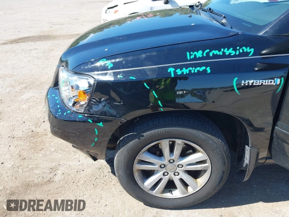 2007 Toyota Highlander Hybrid with VIN JTEHW21A970039728, listed as a IAAI auction lot 42044242 with 200,798 mi miles. Bid and sale history available at carsss.com. Image 6.