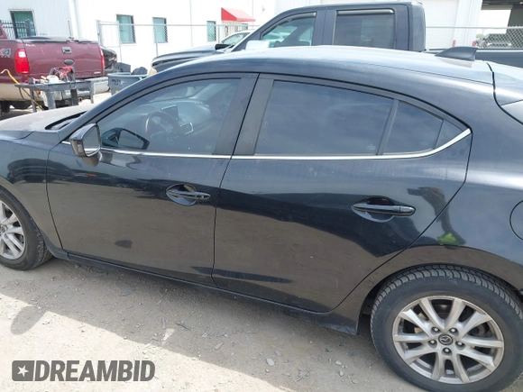 2014 Mazda 3 i Grand Touring z VIN JM1BM1M75E1151329, wystawiony jako IAAI lot #42248334 z przebiegiem 138 748 mil mil oraz . Historia ofert i sprzedaży dostępna na DreamBid. Obrazek 14.
