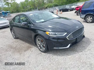 2020 Ford Fusion SEL with VIN 3FA6P0CD5LR131097, listed as a IAAI auction lot 42218517 with 94,394 mi miles and . Bid and sale history available at DreamBid. Image 1.