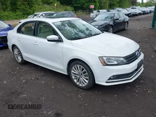2016 Volkswagen Jetta SEL z VIN 3VWL07AJ3GM297959, wystawiony jako IAAI lot #42319444 z przebiegiem 50 130 mil mil oraz . Historia ofert i sprzedaży dostępna na DreamBid. Obrazek 1.