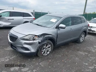 2015 Mazda CX-9 Sport with VIN JM3TB3BV2F0454770, listed as a IAAI auction lot 42009879 with 98,916 mi miles and . Bid and sale history available at carsss.com. Image 17.