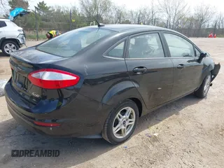 2018 Ford Fiesta SE with VIN 3FADP4BJ8JM103973, listed as a IAAI auction lot 42163251 with 145,205 mi miles and . Bid and sale history available at DreamBid. Image 4.