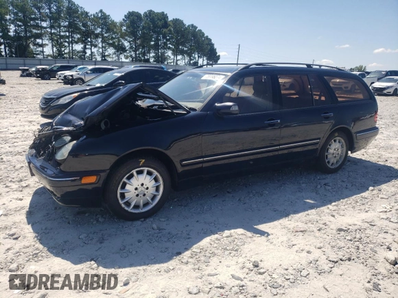 2001 Mercedes-Benz E-Class AWD with VIN WDBJH82J91X057063, listed as a Copart auction lot 70235274 with 174,846 mi miles and Salvage Title. Bid and sale history available at carsss.com. Image 1.