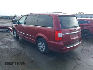 2013 Chrysler Town & Country Touring with VIN 2C4RC1BG0DR634631, listed as a IAAI auction lot 40686174 with 143,206 mi miles. Bid and sale history available at carsss.com. Image 3.