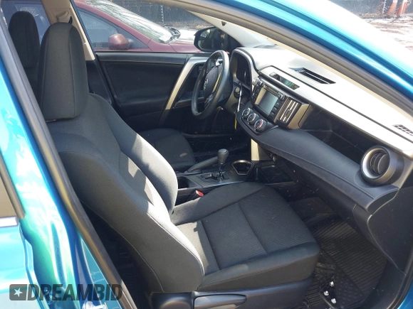 2018 Toyota RAV4 LE with VIN JTMBFREV3JJ253566, listed as a IAAI auction lot 41978107 with 49,729 mi miles. Bid and sale history available at carsss.com. Image 5.