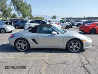 2007 Porsche Boxster с VIN WP0CA29837U710558, выставлен на аукционе IAAI как лот 42506943 с пробегом 129 446 миль миль и . История ставок и продаж доступна на DreamBid. Изображение 13.