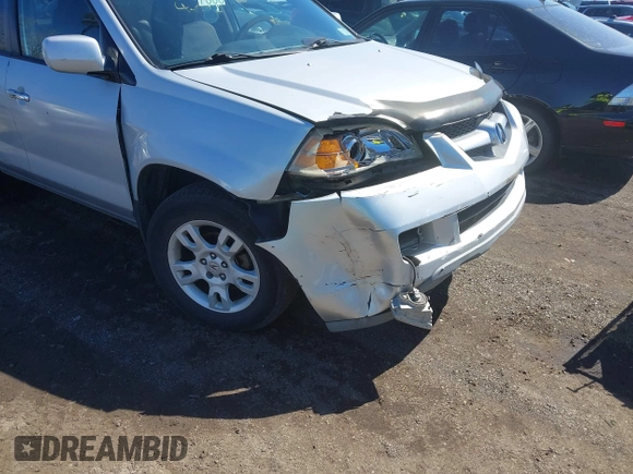 2004 Acura MDX Touring Pkg RES w/Nav with VIN 2HNYD189X4H523022, listed as a IAAI auction lot 41804292 with 165,586 mi miles. Bid and sale history available at carsss.com. Image 6.