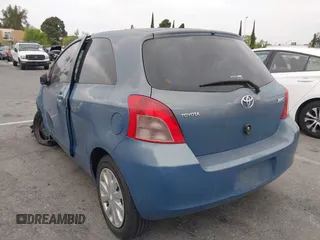 2008 Toyota Yaris with VIN JTDJT923585174474, listed as a IAAI auction lot 42025174 with 126,500 mi miles. Bid and sale history available at carsss.com. Image 3.