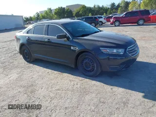 2015 Ford Taurus SEL z VIN 1FAHP2E87FG194024, wystawiony jako IAAI lot #40568953 z przebiegiem 305 087 mil mil oraz . Historia ofert i sprzedaży dostępna na DreamBid. Obrazek 1.