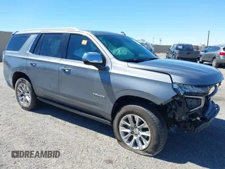 2021 Chevrolet Tahoe Premier with VIN 1GNSKSKTXMR332297, listed as a IAAI auction lot 42203074 with 59,758 mi miles and . Bid and sale history available at DreamBid. Image 1.