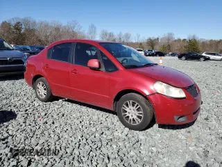 2012 Suzuki SX4 LE with VIN JS2YC5A3XC6301561, listed as a Copart auction lot 44514305 with 247,718 mi miles and Salvage Title. Bid and sale history available at DreamBid. Image 4.