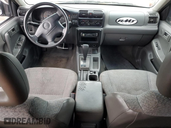 1998 Isuzu Rodeo S z VIN 4S2CK58W1W4327395, wystawiony jako Copart lot #44400715 z przebiegiem 193 659 mil mil oraz Szkoda całkowita • Salvage title. Historia ofert i sprzedaży dostępna na DreamBid. Obrazek 8.