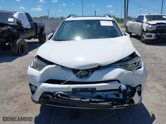 2017 Toyota RAV4 XLE with VIN 2T3RFREV1HW683851, listed as a IAAI auction lot 42051722 with 98,307 mi miles. Bid and sale history available at carsss.com. Image 6.