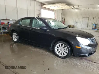 2010 Chrysler Sebring Limited with VIN 1C3CC5FB2AN229671, listed as a Copart auction lot 62181015 with 229,390 mi miles and Salvage title. Bid and sale history available at DreamBid. Image 4.