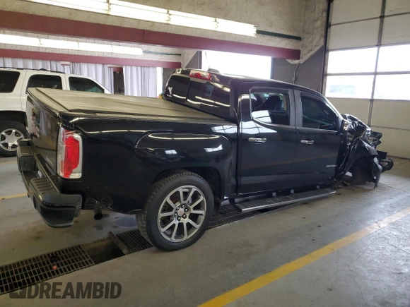 2018 GMC Canyon 4WD Denali with VIN 1GTP6EE18J1223703, listed as a Copart auction lot 84280794 with 97,592 mi miles and Salvage Title. Bid and sale history available at carsss.com. Image 3.