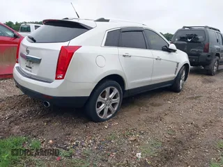 2010 Cadillac SRX Premium Collection z VIN 3GYFNCEY4AS569787, wystawiony jako IAAI lot #42524167 z przebiegiem 222 000 mil mil oraz . Historia ofert i sprzedaży dostępna na DreamBid. Obrazek 4.