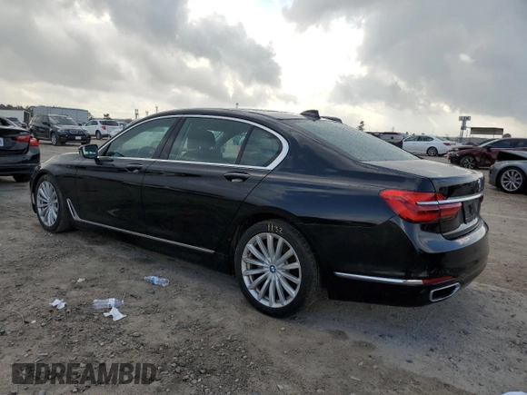 2018 BMW 7 Series 740i with VIN WBA7E2C54JG742927, listed as a Copart auction lot 70306082 with 69,735 mi miles. Bid and sale history available at carsss.com. Image 2.