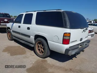 2005 Chevrolet Suburban LT z VIN 1GNEC16ZX5J100236, wystawiony jako IAAI lot #41920678 z przebiegiem 221 124 mil mil oraz . Historia ofert i sprzedaży dostępna na DreamBid. Obrazek 3.
