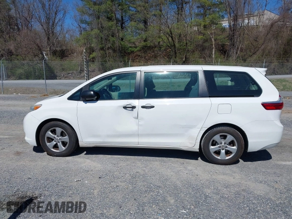 2015 Toyota Sienna L with VIN 5TDZK3DC3FS690484, listed as a IAAI auction lot 41888073 with 201,518 mi miles and . Bid and sale history available at carsss.com. Image 14.