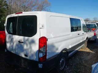 2019 Ford Transit with VIN 1FTYE1ZM9KKB37770, listed as a IAAI auction lot 41626395 with 71,214 mi miles. Bid and sale history available at carsss.com. Image 4.