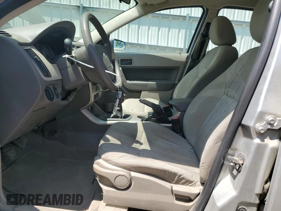 2009 Ford Focus SE z VIN 1FAHP35N99W210276, wystawiony jako Copart lot #59235675 z przebiegiem 143 828 mil mil oraz Czysty tytuł • Clean title. Historia ofert i sprzedaży dostępna na DreamBid. Obrazek 7.
