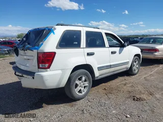 2006 Jeep Grand Cherokee Laredo with VIN 1J4GR48K66C255979, listed as a IAAI auction lot 40365800 with 177,982 mi miles. Bid and sale history available at carsss.com. Image 4.