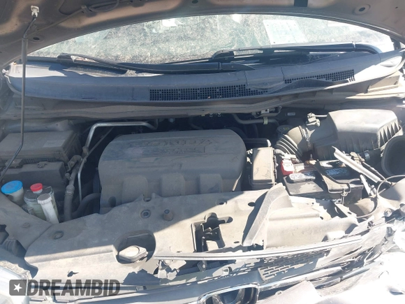 2012 Honda Odyssey EX-L with VIN 5FNRL5H61CB095789, listed as a IAAI auction lot 42065507 with 138,570 mi miles and . Bid and sale history available at DreamBid. Image 10.