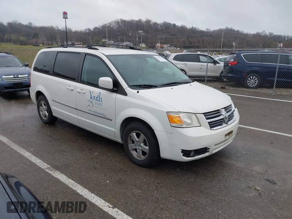 2010 Dodge Grand Caravan SXT with VIN 2D4RN5D1XAR191011, listed as a IAAI auction lot 41162015 with 83,251 mi miles and . Bid and sale history available at DreamBid. Image 1.