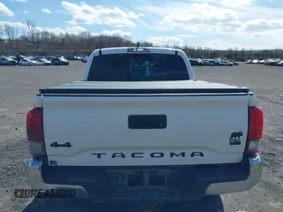 2020 Toyota Tacoma SR5 with VIN 3TMCZ5AN5LM339977, listed as a IAAI auction lot 41886937 with 94,986 mi miles and . Bid and sale history available at DreamBid. Image 16.