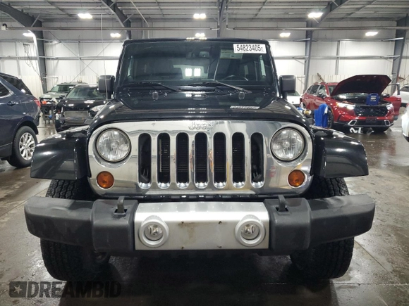 2013 Jeep Wrangler Sahara z VIN 1C4AJWBG5DL566559, wystawiony jako Copart lot #54823405 z przebiegiem 134 099 mil mil oraz Szkoda całkowita • Salvage title. Historia ofert i sprzedaży dostępna na DreamBid. Obrazek 5.