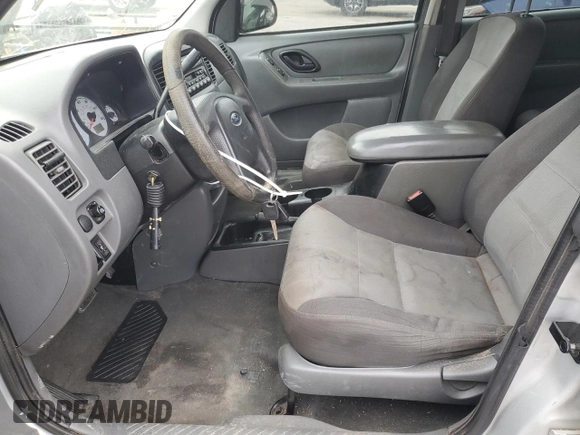 2003 Ford Escape XLS Popular with VIN 1FMYU02173KB43156, listed as a Copart auction lot 51534495 with 266,600 mi miles and Salvage title. Bid and sale history available at DreamBid. Image 7.