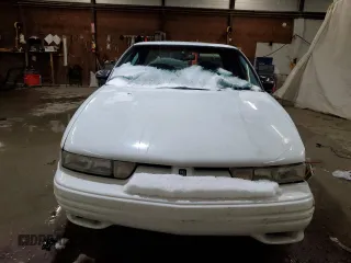 1997 Oldsmobile Cutlass Supreme S z VIN 1G3WH52M2VF354848, wystawiony jako Copart lot #41706835 z przebiegiem 80 995 mil mil oraz Szkody całkowita. Historia ofert i sprzedaży dostępna na DreamBid. Obrazek 5.