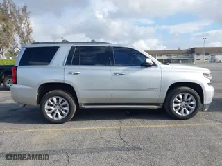 2015 Chevrolet Tahoe LT with VIN 1GNSCBKC8FR114732, listed as a IAAI auction lot 41900157 with 107,298 mi miles. Bid and sale history available at carsss.com. Image 12.