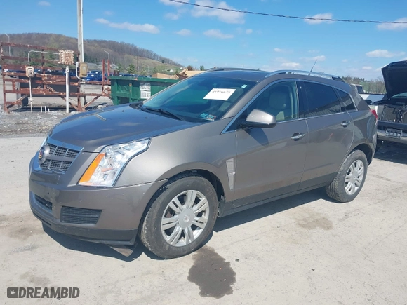 2012 Cadillac SRX Luxury Collection with VIN 3GYFNDE36CS542006, listed as a IAAI auction lot 41976675 with 137,418 mi miles. Bid and sale history available at carsss.com. Image 2.